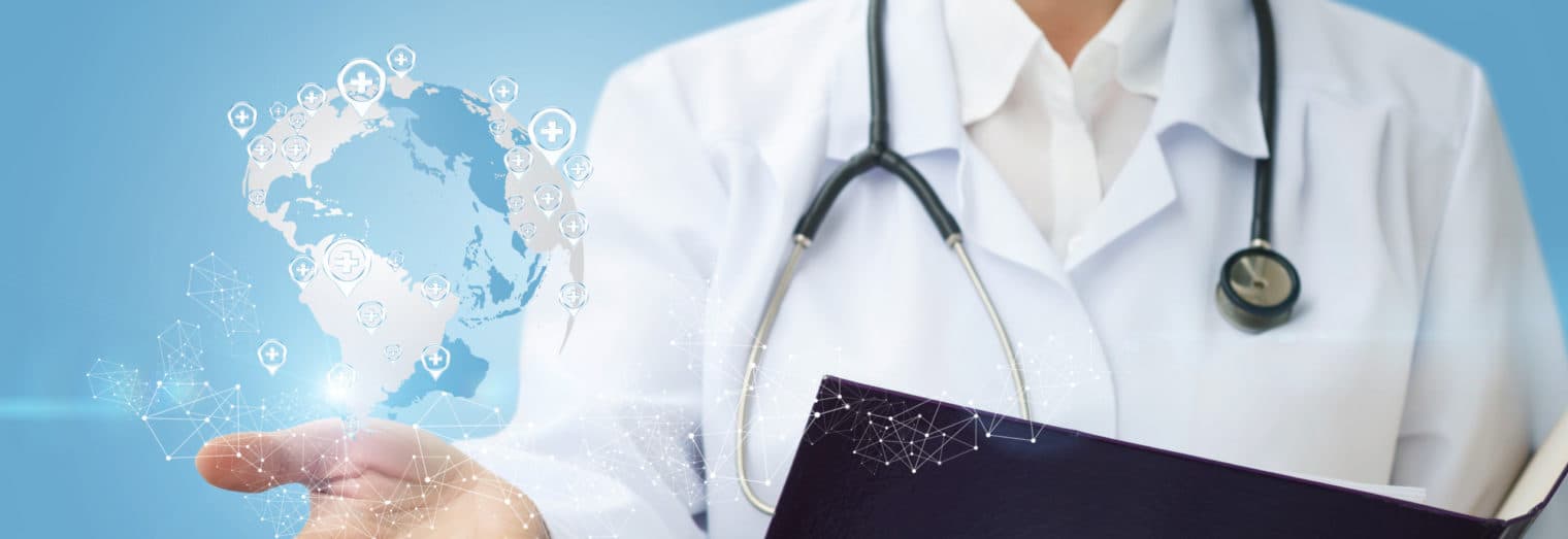 Healthcare professional holding a connected globe, a symbol of international healthcare projects